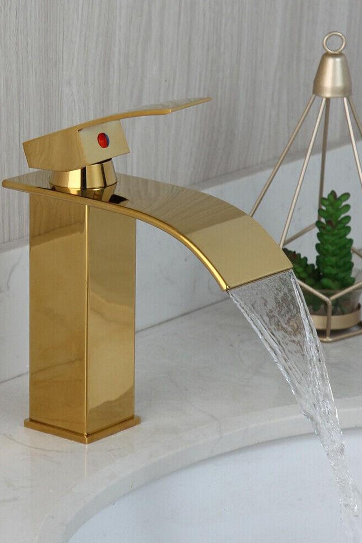 faucet basin gold